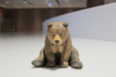 a plastic bear toy on backgroundの写真素材