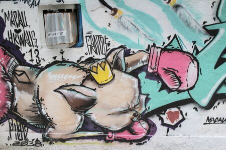 a facade in old town with graffiti at centralのeditorial素材