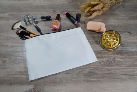 Decorative cosmetics isolated over wood backgroundのeditorial素材