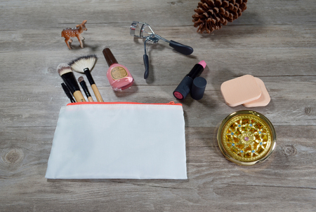 Decorative cosmetics isolated over wood backgroundのeditorial素材