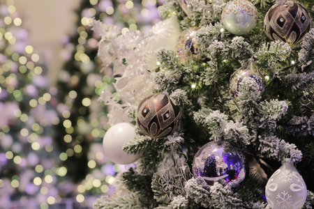 Christmas tree with colorful balls indoorの写真素材