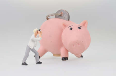 the small figure photographer taking the fun worldの写真素材