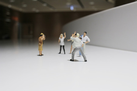 the Miniature people family concept with white background