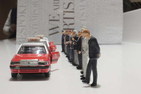 the small figure with taxi at hong kongの写真素材