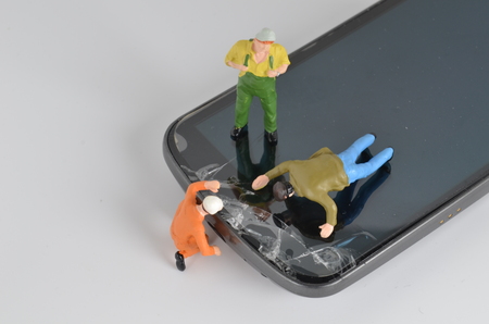 the Team of engineers repairing circuit moble phoneの写真素材