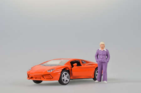 the orange plastic toy car isolatedの写真素材