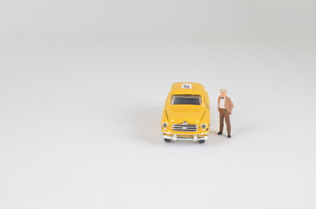 new york yellow cab taxi toy car with figureの写真素材