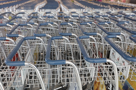 the baggage trolleys near entrance to Hong Kong Airport.