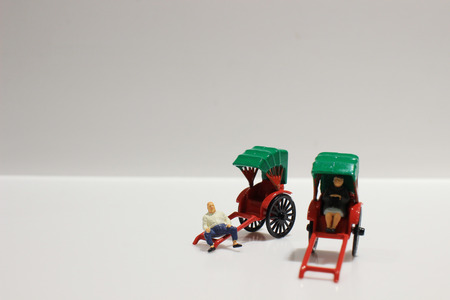 Toy, miniature figures of human in costumes, view from aboveの写真素材