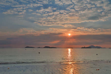 the Sunset on a sea beach at Sha Po Kongの写真素材