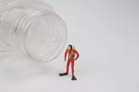 a  small diver of fun toy with back groundの写真素材