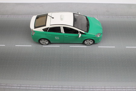 taxi car model. isolated on road  backgroundの写真素材