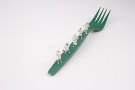 Group of cook are talking in the kitchen.の写真素材