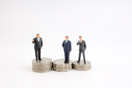 Businessman figurine planning about retirement pensionのeditorial素材