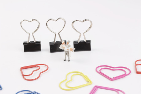 tiny of wedding figure with paper clipの写真素材