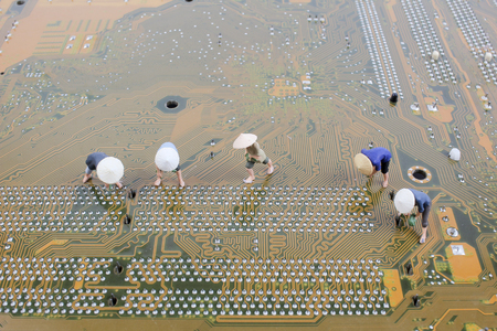 the fun Figurine peasants on PC boardの写真素材