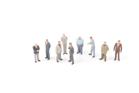 Miniature people businessman on white backgroundの写真素材