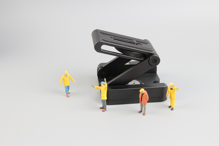 the Group of construction workers repairing tool
