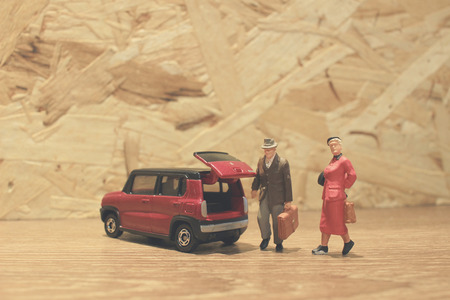the Mini businessman and tourist people with carの写真素材