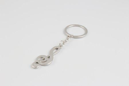 the music Key ring on white back ground 