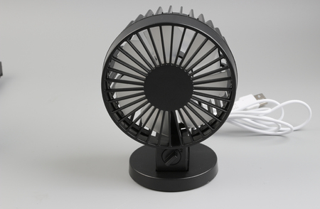 mini isolated black fan with usb at boardの写真素材