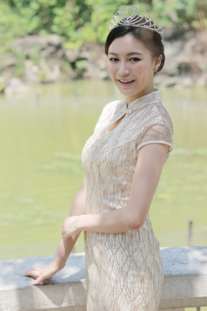 the Chinese girl dressed in traditional dressのeditorial素材