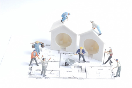 the tiny figure of worker construction the siteの写真素材