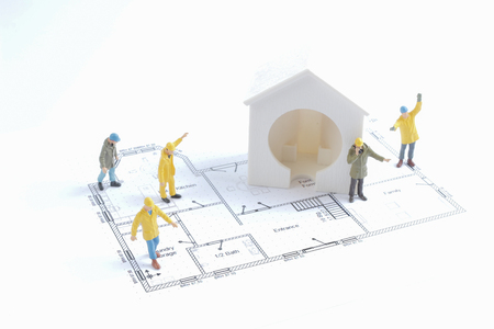 the tiny figure of worker construction the siteの写真素材