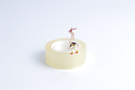 the fun of Tiny toy skaters on CDの写真素材