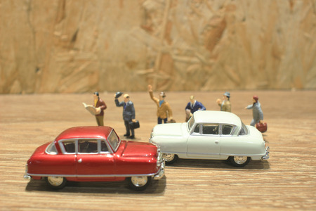 the fun of smal business figure withe the carの写真素材