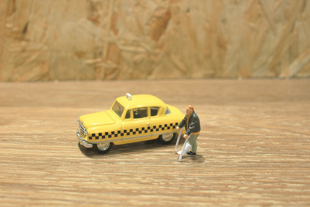 the small figure of Medicine crutch wait taxiの写真素材