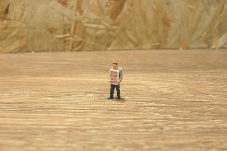the small fun of figure in miniature worldの写真素材