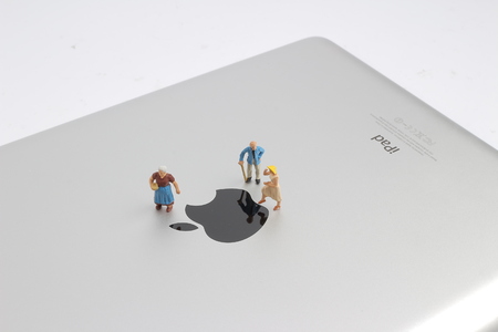 the little farmer work on the apple logoの写真素材