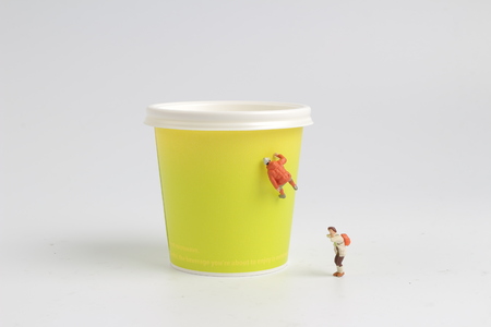 the fun of figure climb the paper cupの写真素材