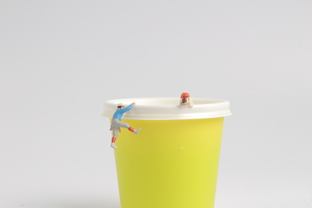 the fun of figure climb the paper cupの写真素材