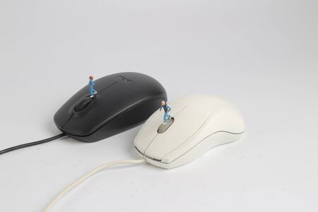 the fun of figure run on the PC mouseの写真素材