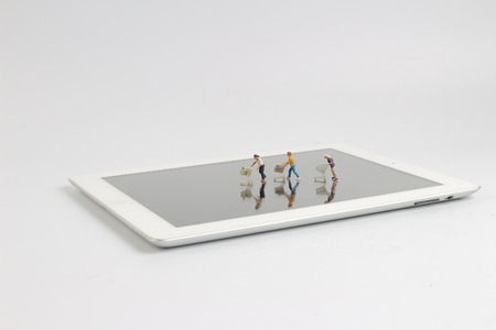 the shopping cart or trolley figure toy on screenの写真素材