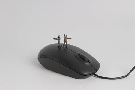 the min SWAT team on top of  mouseの写真素材