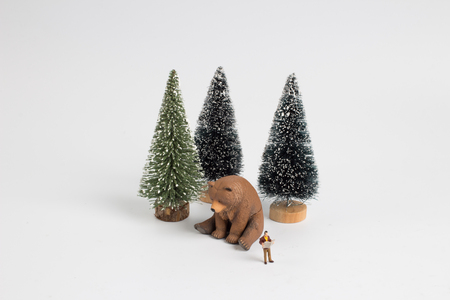 the mini figure read the newspaper with the bearの写真素材