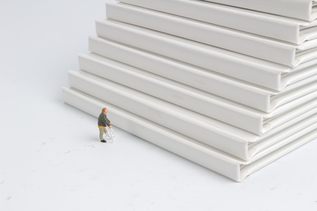 the figure of  wheel chair by stairs.の写真素材