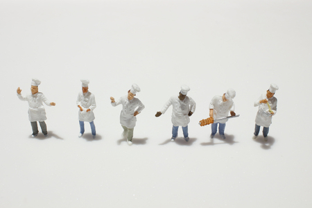the tiny of cook are talking in the kitchen.の写真素材