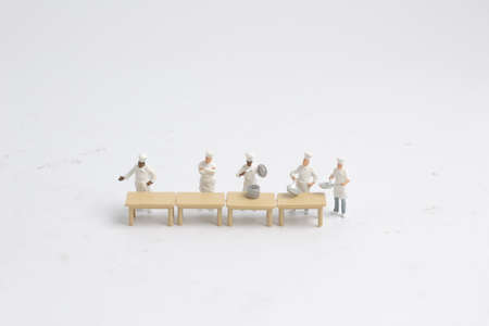 a Group of cook are talking in the kitchen.の写真素材