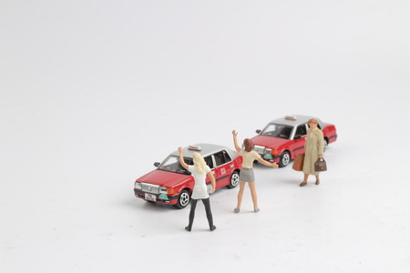 figure and hk taxi at white boardの写真素材