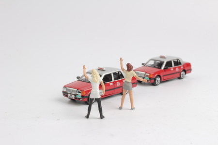 figure and hk taxi at white boardの写真素材