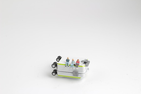 the fun figure with the luggage with travel