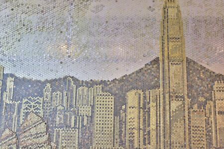 the backdrop made of coins with hong kong cityscapeの写真素材