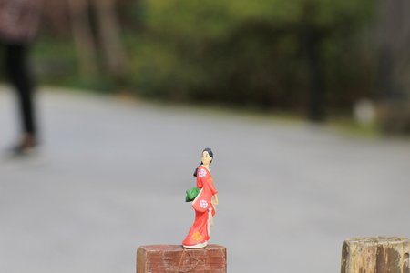 the doll of japnese figure at outdoor at fallの写真素材