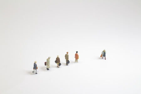 traveler figures with luggages waiting for departure 