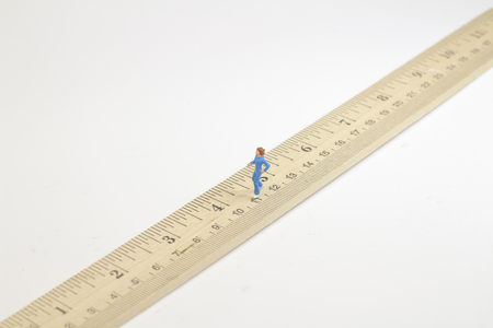 a figure running on the wood  rule