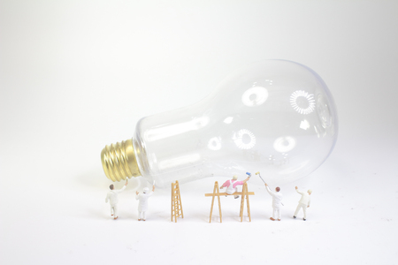 the mini worker work with the lampの写真素材